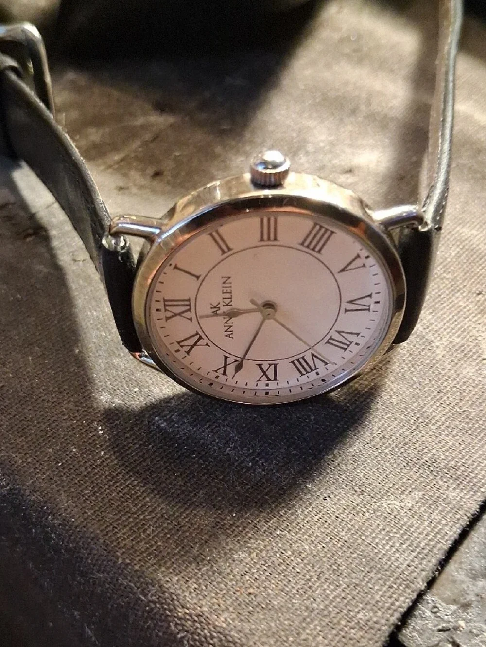 Anne Klein Silver Case White Dial Watch with Black Leather Strap